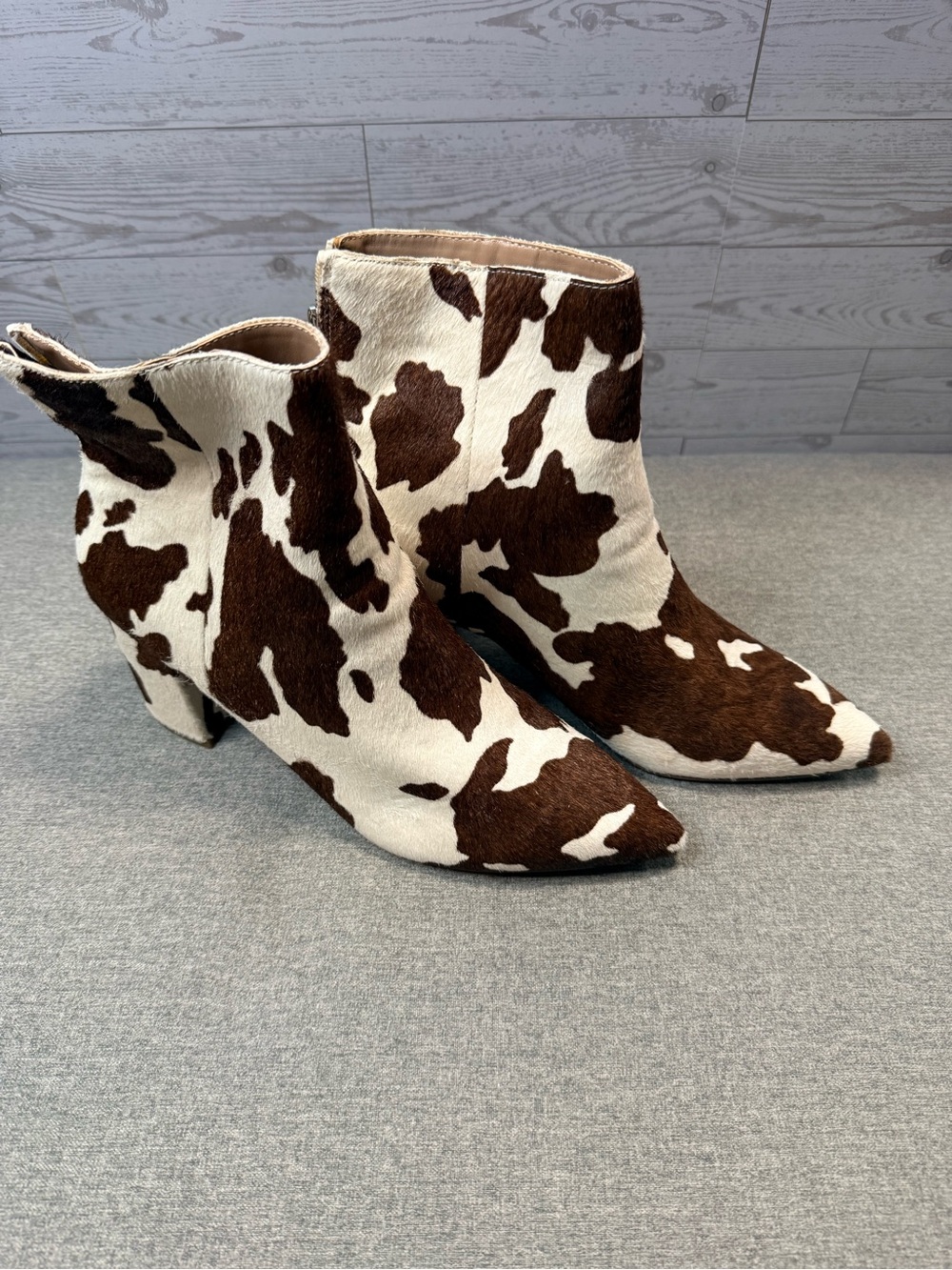 Steve Madden Cowhide-Print Pointed Toe Ankle Boots in Brown & White
